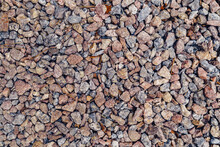Background Of Natural Grey Granite Crushed Stone, Macadam. Macro Photo Of Texture Of Broken Stone Or Rubble With Place For Text. Crushed Rock. Construction Materials. Textures.