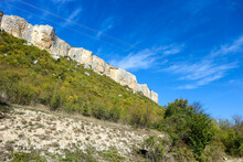 Autumn View Of Landscape With Limestone Cliffs Under Blue Sky And Clouds