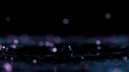 Sticker - Super slow motion of splashing water crown illuminated by neon lights. Filmed on very high speed camera, 1000 fps.