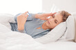 © StockPhotoPro - Young woman with flu