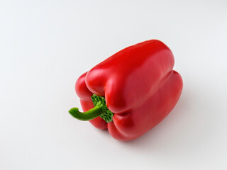 Wall Mural - Red Bell Pepper Close-up on White Background