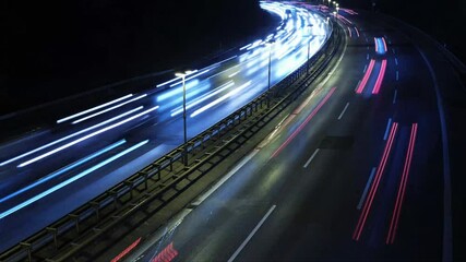 Poster - Time lapse of road traffic in Berlin. The car lights draw light trails on the busy street at N