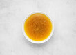 beef broth on gray concrete background