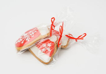 Wall Mural - baked Christmas gingerbread cookies in a polyethylene bag on a white background