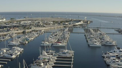 Wall Mural - Aerial, drone footage of yachts and boats docked at the marina in Long Beach California