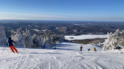 Wall Mural - Skiers in Mont Tremblant summit, Quebec, Canada