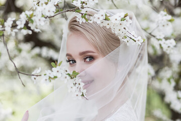 Wall Mural - Young beautiful bride in white dress