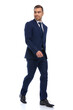 © Viorel Sima - elegant young man in navy blue suit looking to side and smiling
