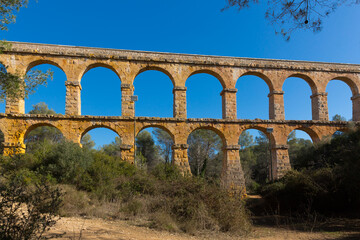 Wall Mural - Tarragona famous bridge Puento del diablo at sunny day view, Spain..