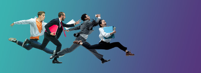 evening. happy office workers jumping and dancing in casual clothes or suit isolated on gradient neo
