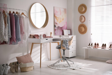 Canvas Print - Dressing room interior with stylish makeup table, clothes and accessories