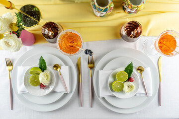 Spring table set for a party. Mise en place