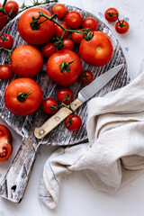 Wall Mural - Freshly washed tomatoes on a cutting board