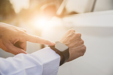 Wall Mural - People use technology smartwatch to open and start engine the car