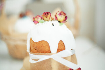 Wall Mural - Traditional russian easter cake on table. The decorarion of kulich are the flower are eating on spring holiday