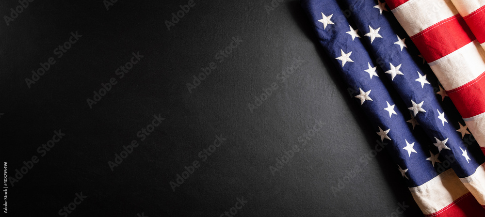 Obraz na płótnie Happy presidents day concept with flag of the United States on black wooden background. w salonie