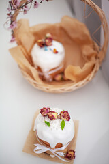 Wall Mural - Traditional russian easter cake on table. The decorarion of kulich are the flower are eating on spring holiday