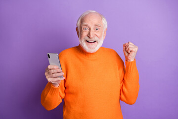 Poster - Portrait of delighted person fist up celebrate triumph unbelievable success isolated on purple color background