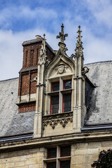 Architectural fragments of an old building in the in Paris Marais district. France.