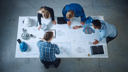Poster - Team of Industrial Engineers Lean on Office Table, Analyze Machinery Blueprints, Architectural Problem Solving, Consult Project on Tablet Computer, Inspect Metal Component. Flat Lay Top Down View