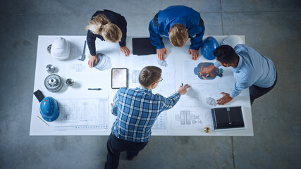 Poster - Team of Industrial Engineers Lean on Office Table, Analyze Machinery Blueprints, Architectural Problem Solving, Consult Project on Tablet Computer, Inspect Metal Component. Flat Lay Top Down View