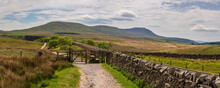 Yorkshire Dales Landscape With The Ribblehead Viaduct And Ingleborough In The Background, Seen From Blea Moor, North Yorkshire, England, UK