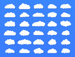 Set of vector cartoon clouds on a blue background. Set of blue sky.