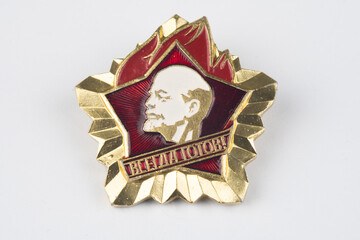 soviet metallic badge on white background