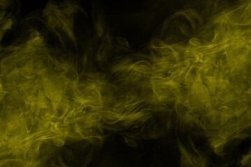 Yellow steam on a black background.