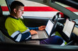 © Javier De La Torre Sebastian/Westend61 - Male technician working on laptop for programming in electric car