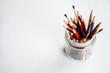 © Clare Seibel-Barnes/Austockphoto - Graded graphite art pencils in jar on white