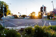 © Clare Seibel-Barnes/Austockphoto - Garden and traffic lights at intersection at sundown