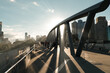 © Gary Radler/Austockphoto - Sunlight shining through architecture with blurred people, Birrarung Marr