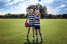 Two Girl Team Players In AFL Football