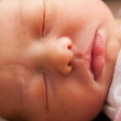 © Mike Kemp/Tetra Images - Baby girl (0-1 month) sleeping
