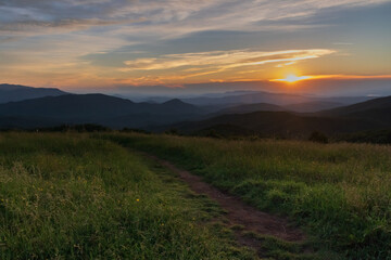 Appalachian Trail at sunset, view from Max Patch bald over the Great Smoky Mountains