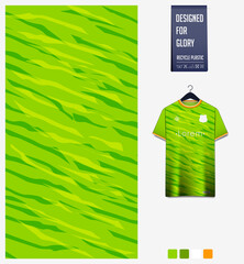 Fabric pattern design. Abstract pattern on green gradient background for soccer jersey, football kit or sports uniform. T-shirt mockup template. Abstract sport background.