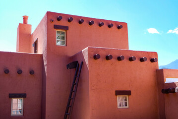 Stucco building, with blue sky