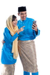 Wall Mural - muslim couple talk to family using smartphone isolated over white background