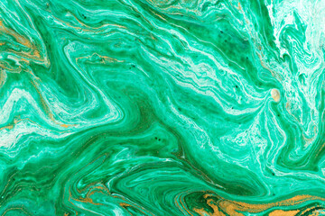  Green marble abstract acrylic background. Marbling artwork texture. Agate ripple pattern. Gold powder.
