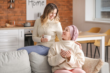 Canvas Print - Daughter visiting her mother after chemotherapy at home