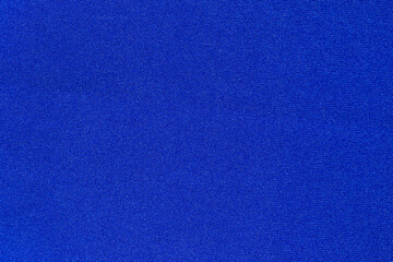 Navy blue fabric cloth polyester texture background.