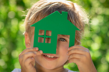 Canvas Print - Eco house in children`s hands