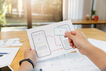 Wall Mural - graphic designers work together with ux ui designer planning application template layout framework f