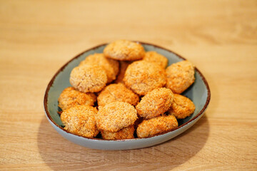 Sticker - Selective focus shot of deliciously baked coconut chip cookies on a plate