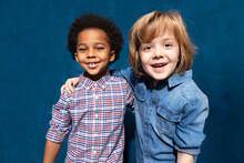 Portrait Of Two Happy Laughing Multiracial Friends Schoolboys. Multiethnic Friendship Of Two Kids, Joyful Black African American Embracing Caucasian Boy In Tolerance Unity, Anti Racism Concept.
