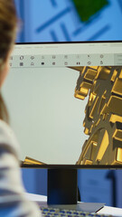 Focused woman architect working at new project using computer doing overtime at night sitting at desk in start-up office. Industrial female engineer studying on pc showing cad software in midnight