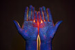 Light through the palms of your hands in ultraviolet, God and religion. Divine light through hand fingers, prophet Muhammad