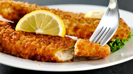 Wall Mural - eating breaded fish and lemon