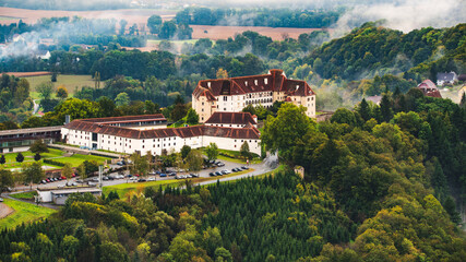 Leibniz, Styria / Austria - 10.10.2019: Seggau palace castle hotel. View from far away travel spot